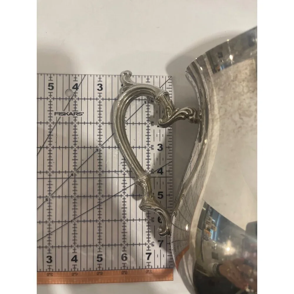 W.M. Rogers Silver Plated Water Pitcher With Guard Preowned in‎ good condition